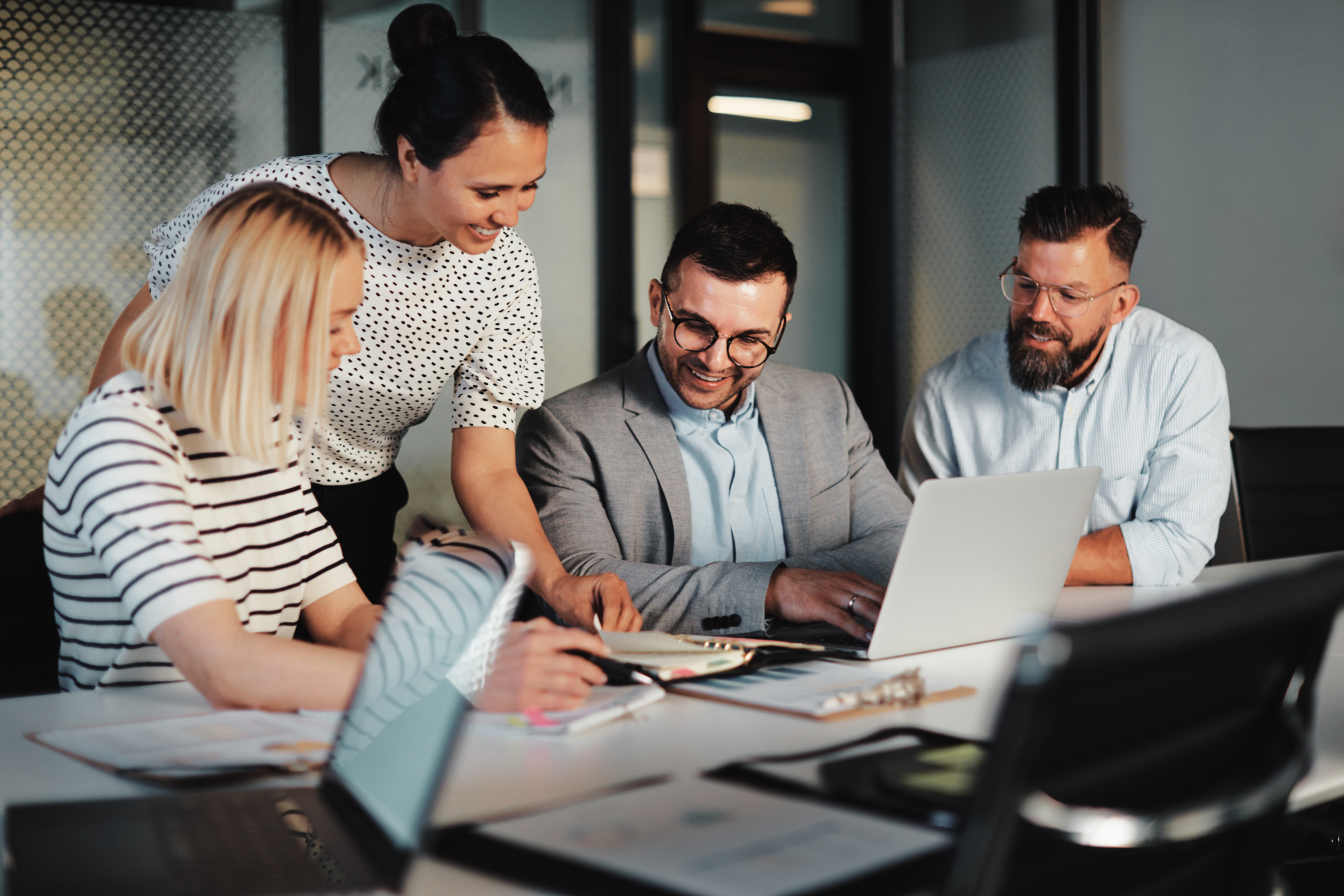 Smiling businesspeople working together